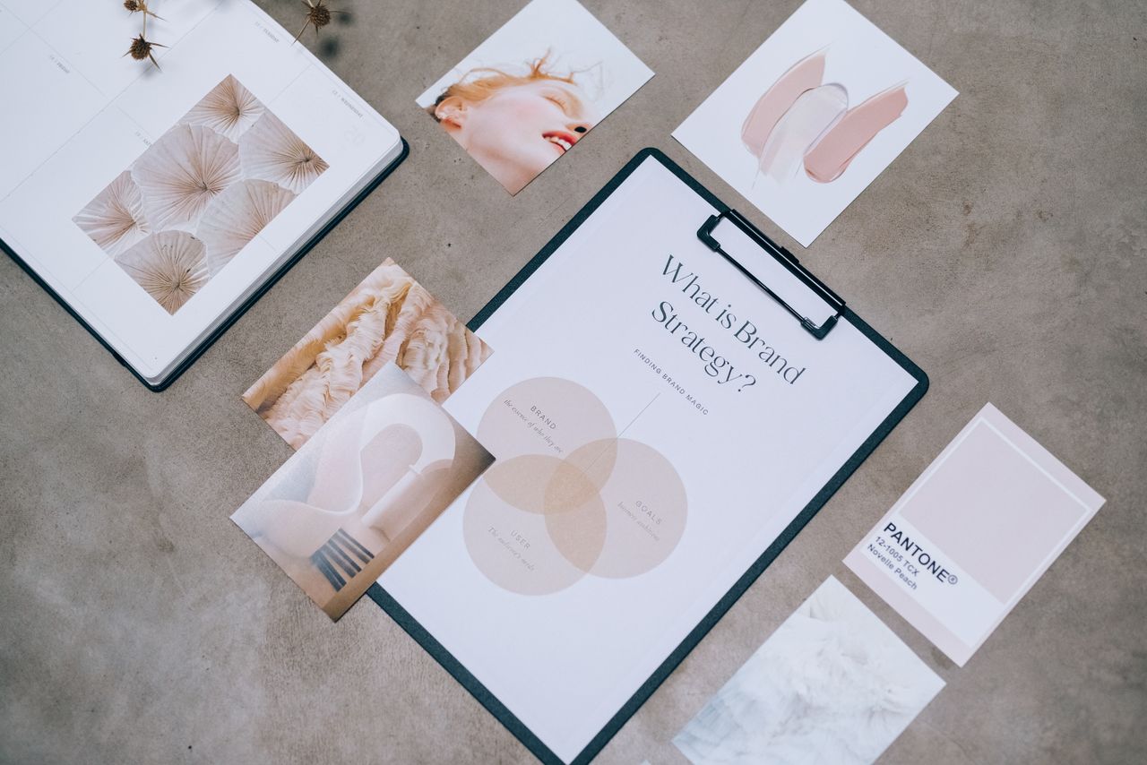 hero-img A flat lay presenting branding materials and design ideas for creative strategy conversations.
